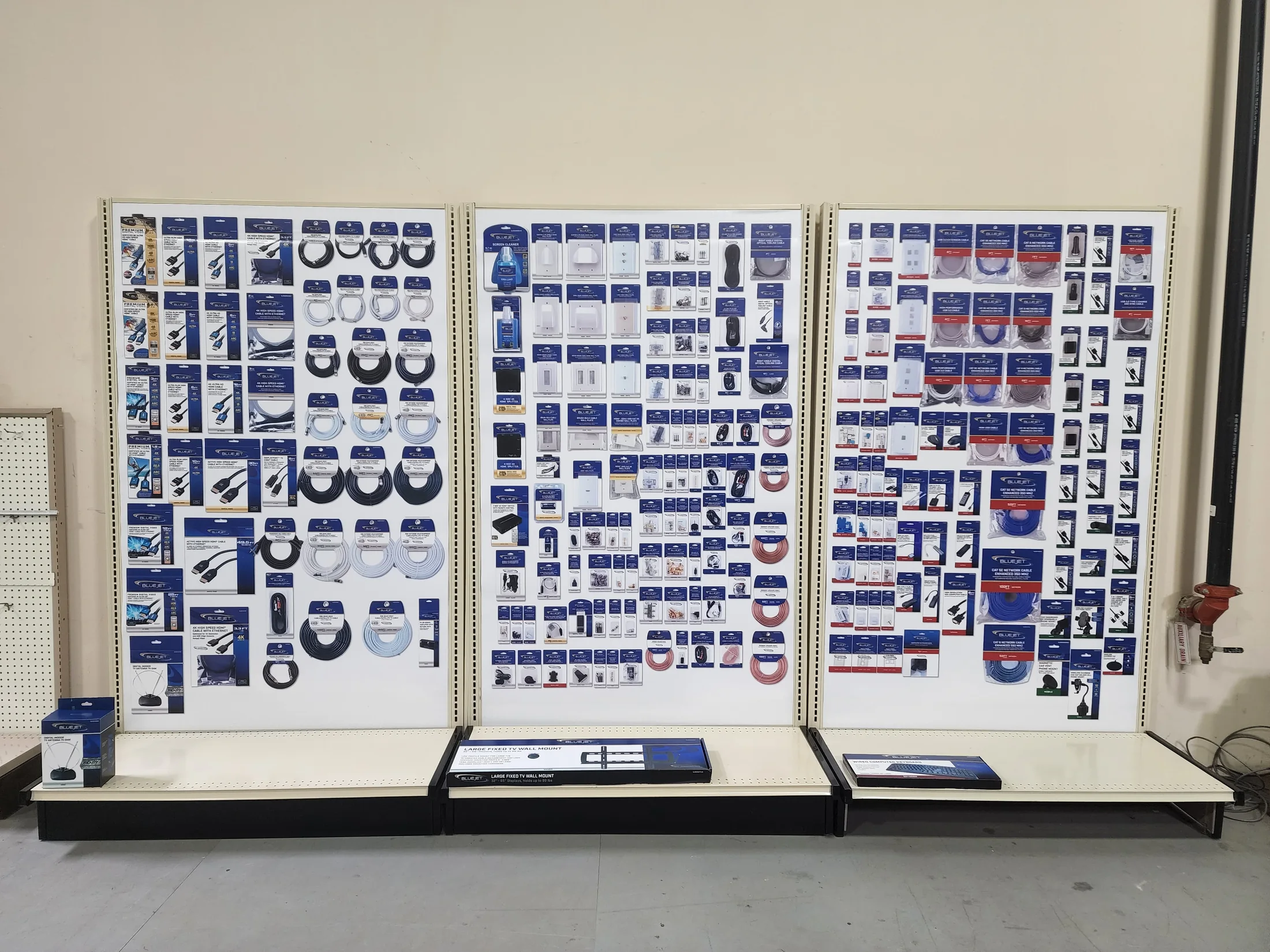 Installed retail display filled with packaged products in a store-like environment